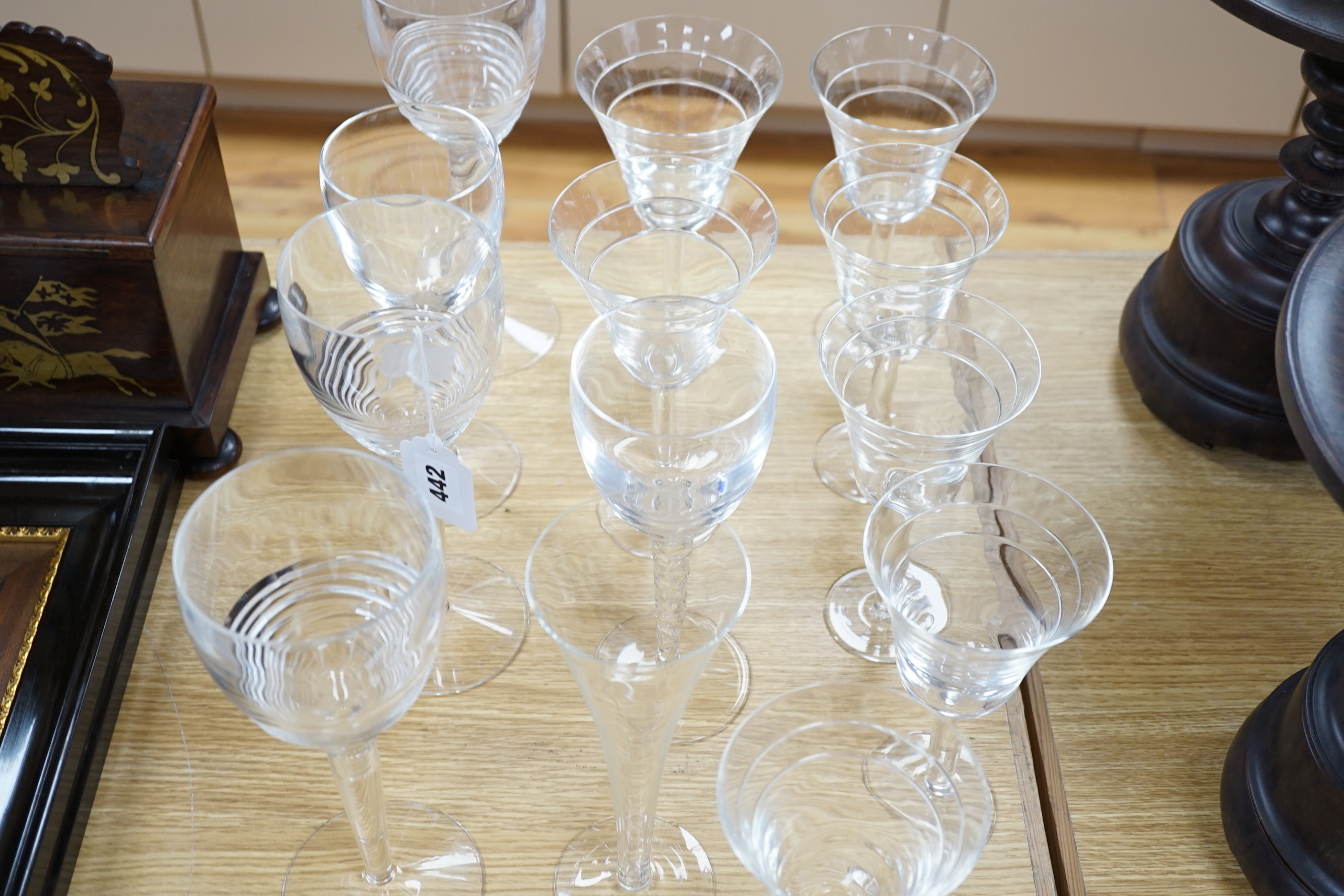 A group of mixed Jasper Conran, Stuart and Tiffany wine and champagne glasses, tallest 25cm high (13)
